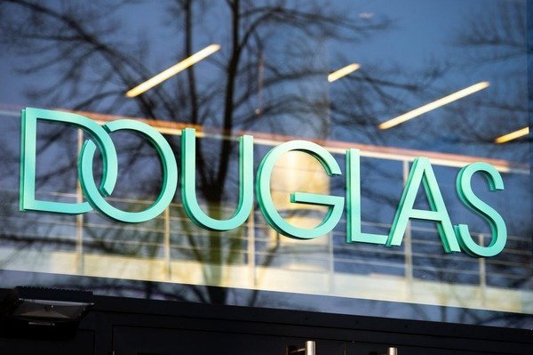 Douglas Reports Q2 Net Loss Amid IPO Costs, Confirms Positive Operating Profit